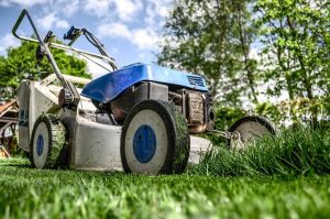 photo of lawnmower cutting grass