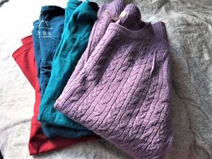 photo of secondhand sweaters and shirt that needed smell removed