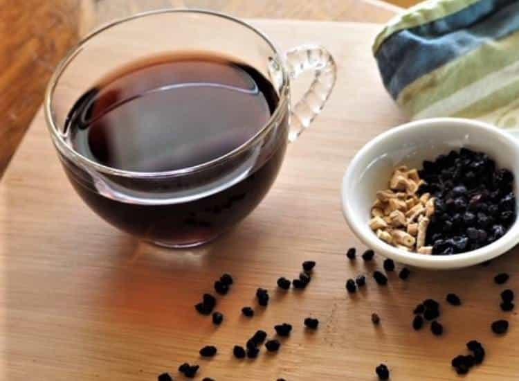 photo of elderberry tea in glass cup