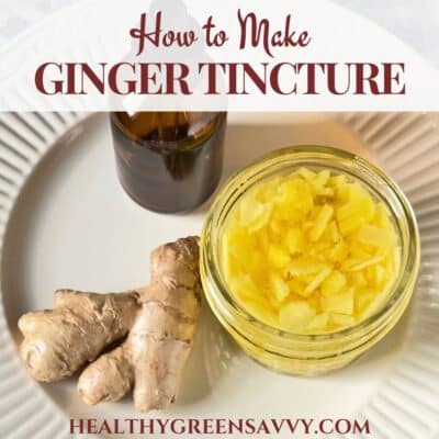 cover photo of fresh ginger steeping in alcohol in glass jar on plate with fresh ginger root and tincture bottle plus title text