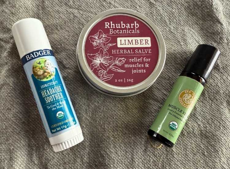 photo of 3 topical pain relief balms I like: Badger's Headache Soother, Liber Salve from Rhubarb Botanicals, and Muscle Relief roll on from