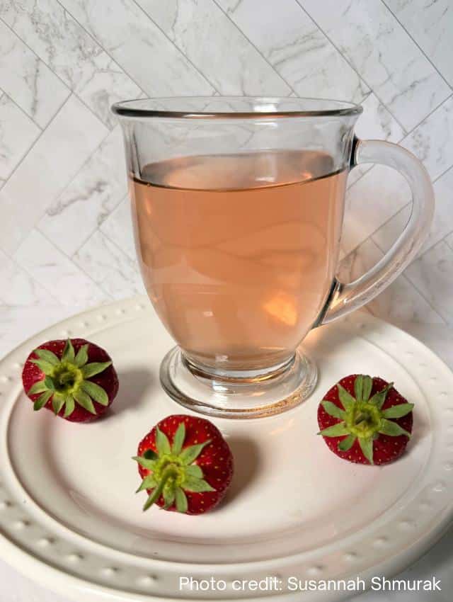 photo of strawberry top tea in glass mug