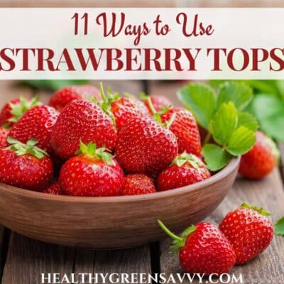 cover photo of wooden bowl filled with whole strawberries with title text overlay (11 ways to use strawberry tops)