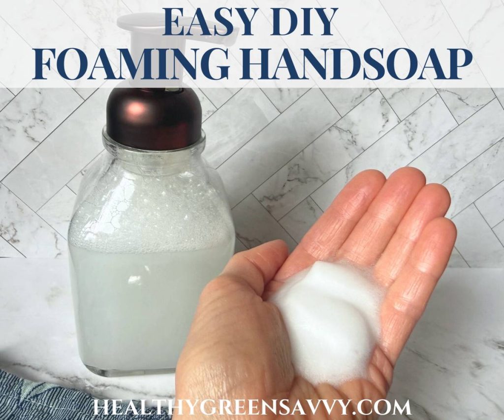 cover photo of DIY foaming hand soap in bottle and on hand with title text overlay