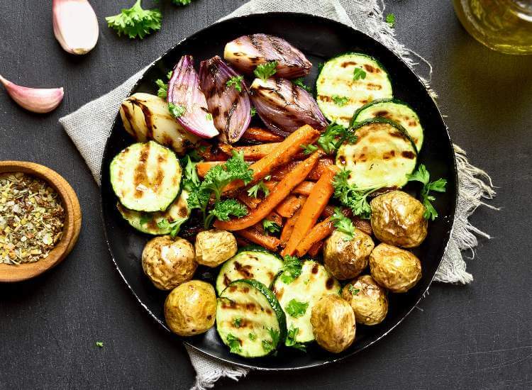 photo of a variety of roasted vegetables on a plate