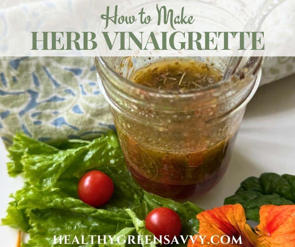 cover photo of herb vinaigrette recipe in jar surrounded with lettuce and nasturtiums plus title text overlay